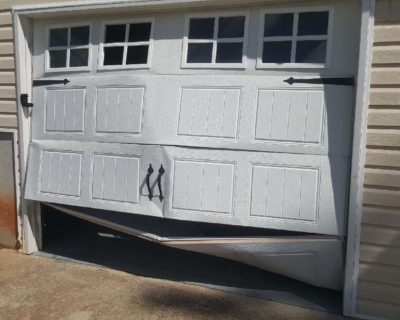damaged-garage-door-replacement-peachtree-city-ga